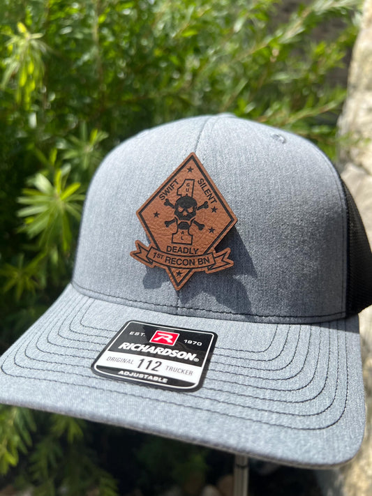 a close up of a hat with a patch on it