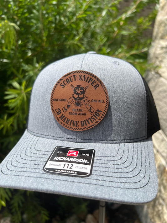 a close up of a hat with a badge on it