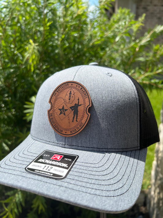 a close up of a hat with a patch on it