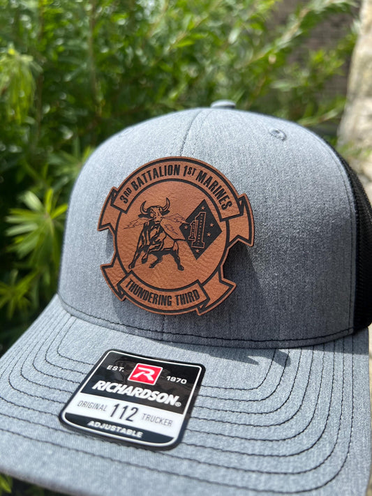 a close up of a hat with a patch on it