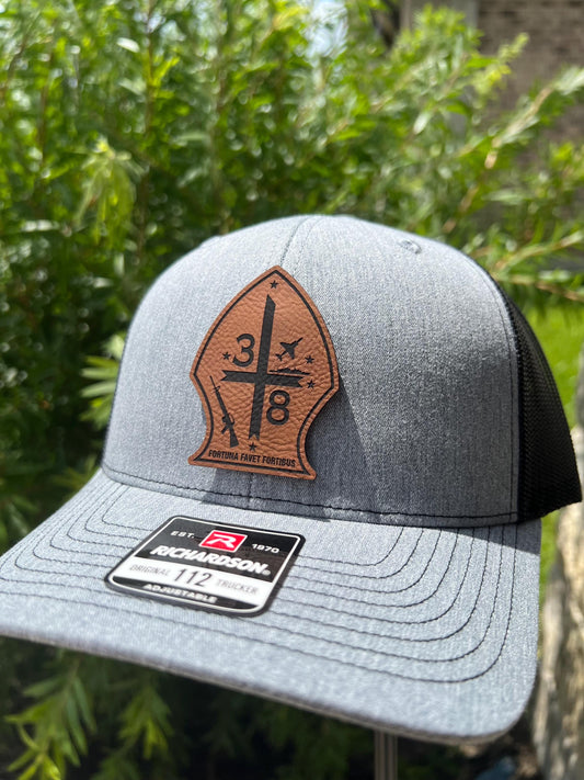 a close up of a hat with a patch on it