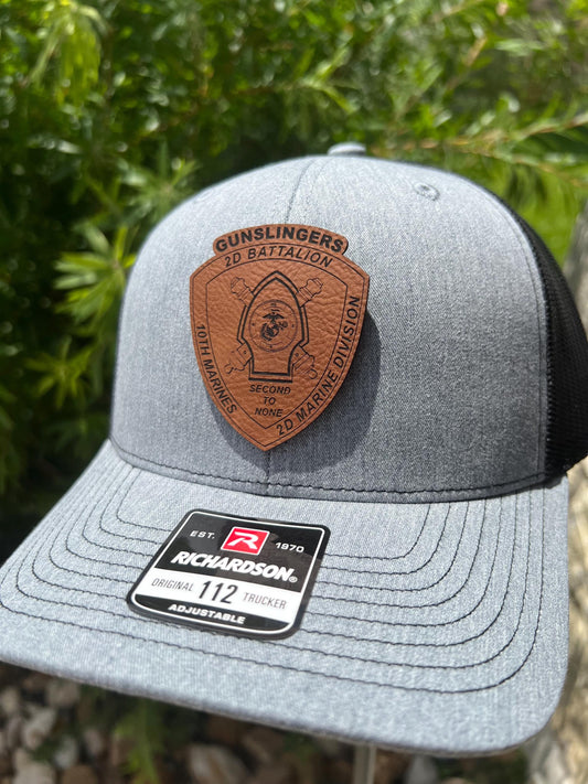 a close up of a hat with a badge on it